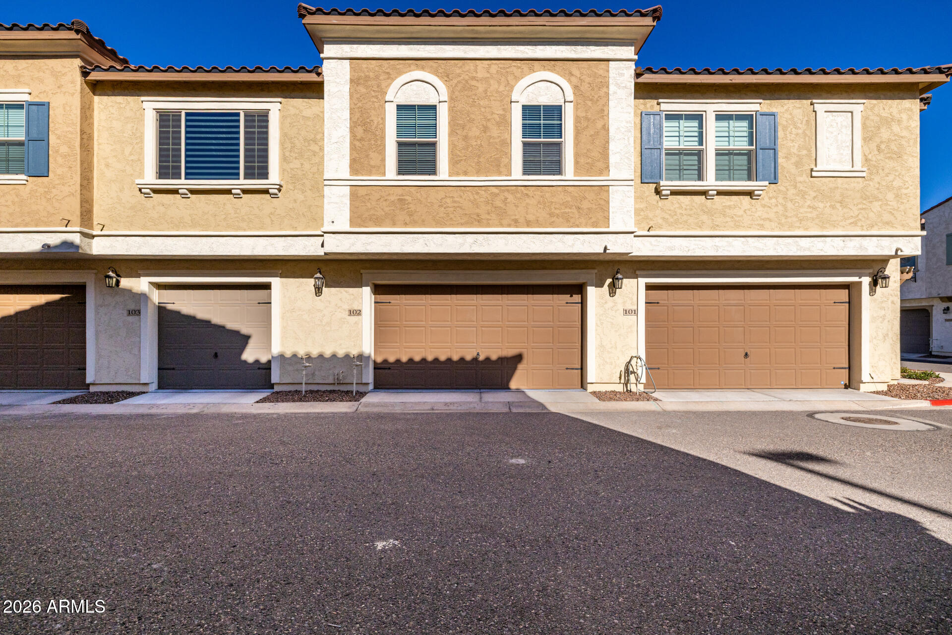 1850 East Bernie Lane, Unit 102 Gilbert, AZ 85295 - Photo 27 of 62 a view of a building with a street