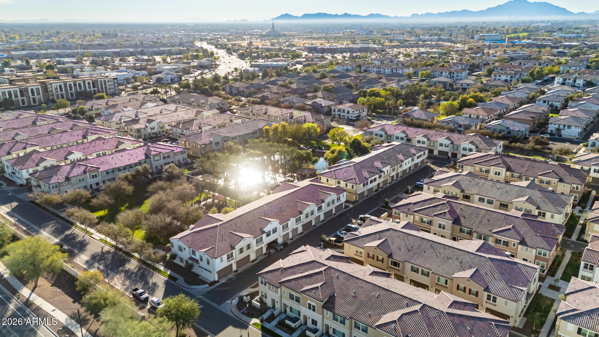 1850 East Bernie Lane, Unit 102 Gilbert, AZ 85295 - Photo 31 of 62 an aerial view of a city with lots of residential buildings