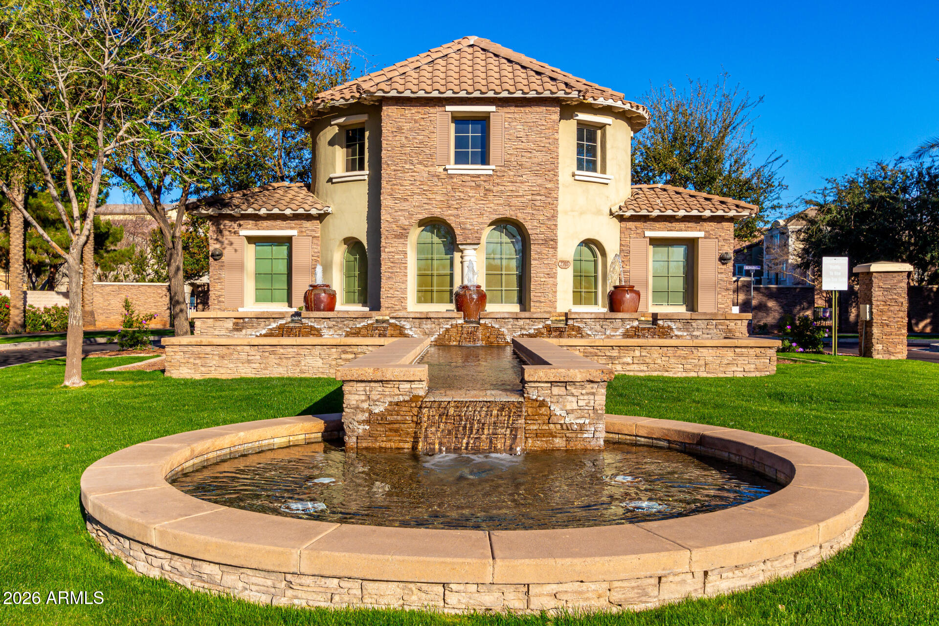 1850 East Bernie Lane, Unit 102 Gilbert, AZ 85295 - Photo 36 of 62 a view of a house with a swimming pool