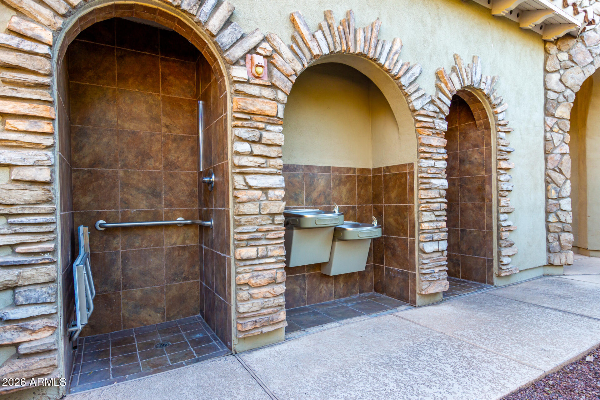 1850 East Bernie Lane, Unit 102 Gilbert, AZ 85295 - Photo 49 of 62 a view of a wooden door with a sink