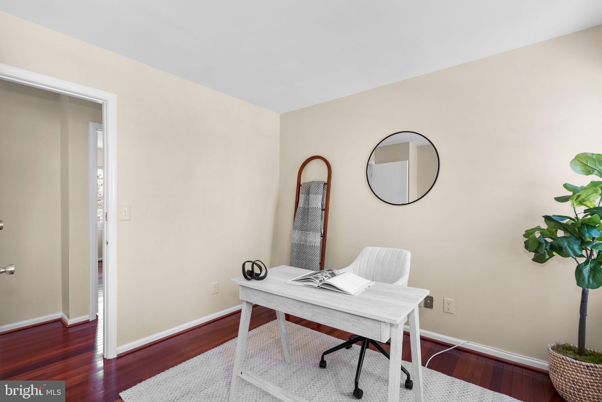 122 Hamilton Avenue Silver Spring, MD 20901 - Photo 28 of 45 a room with a table and chairs