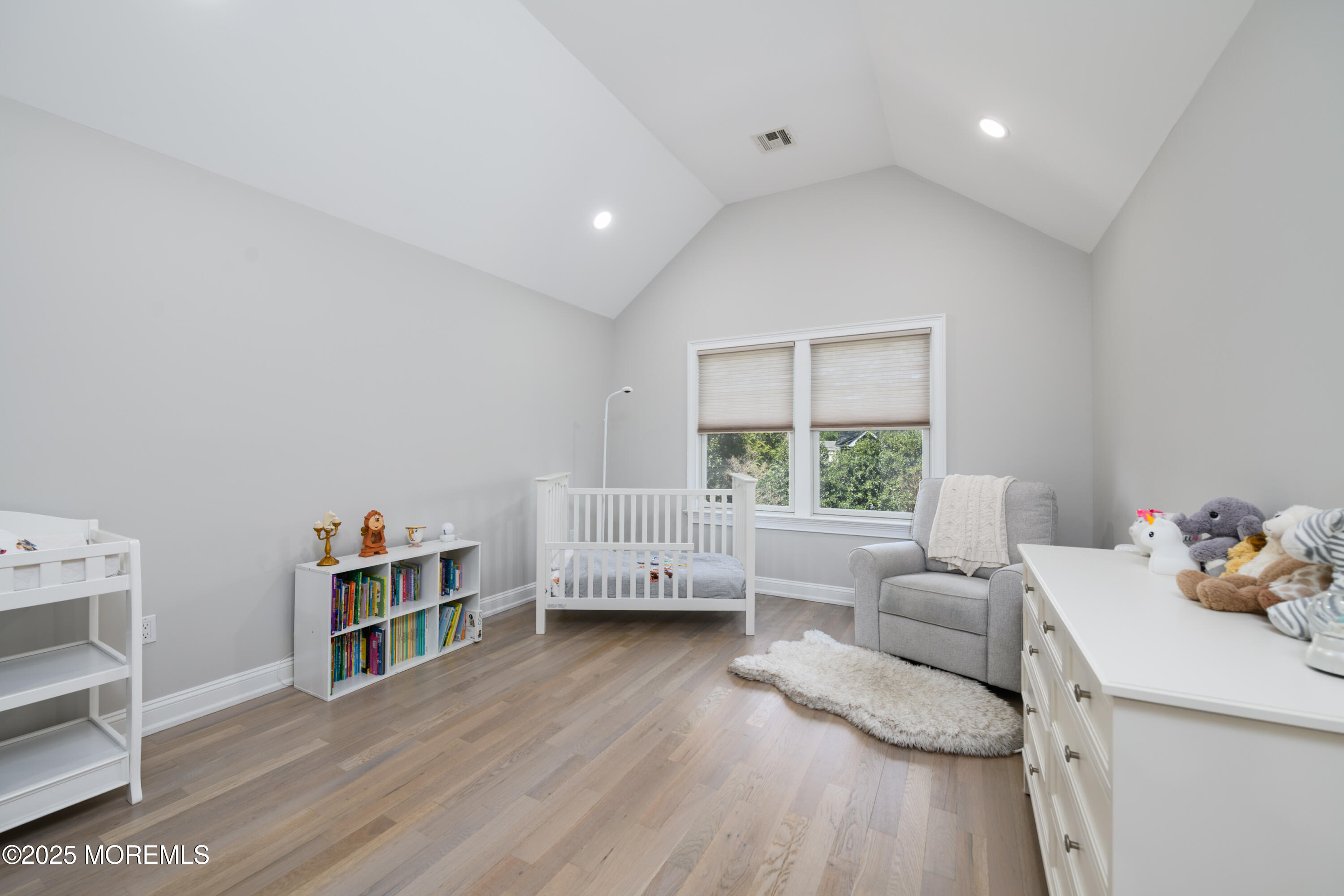 98 Harvard Road Fair Haven, NJ 07704 - Photo 29 of 51 a living room with furniture and a wooden floor