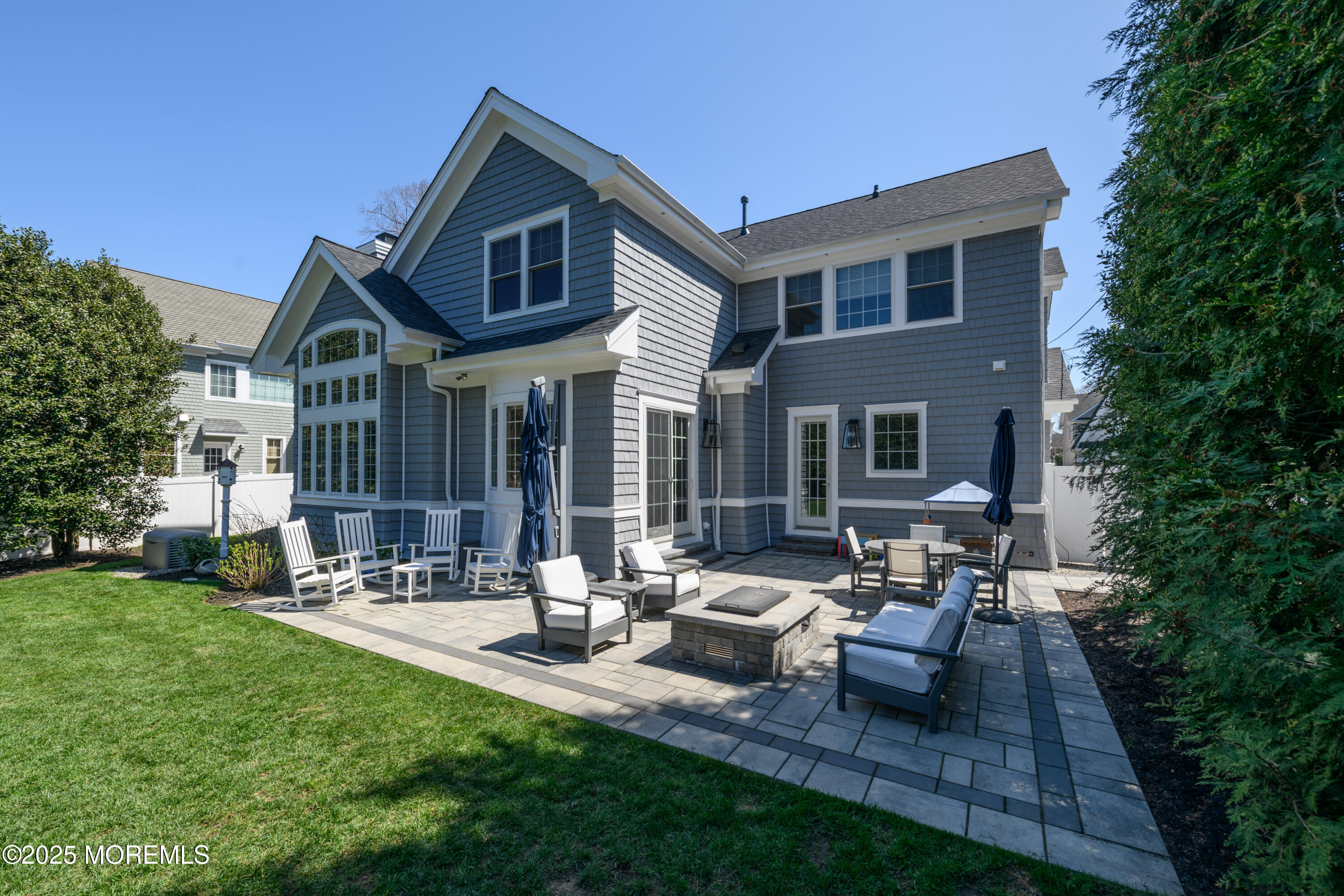 98 Harvard Road Fair Haven, NJ 07704 - Photo 46 of 51 a front view of house with yard and outdoor seating