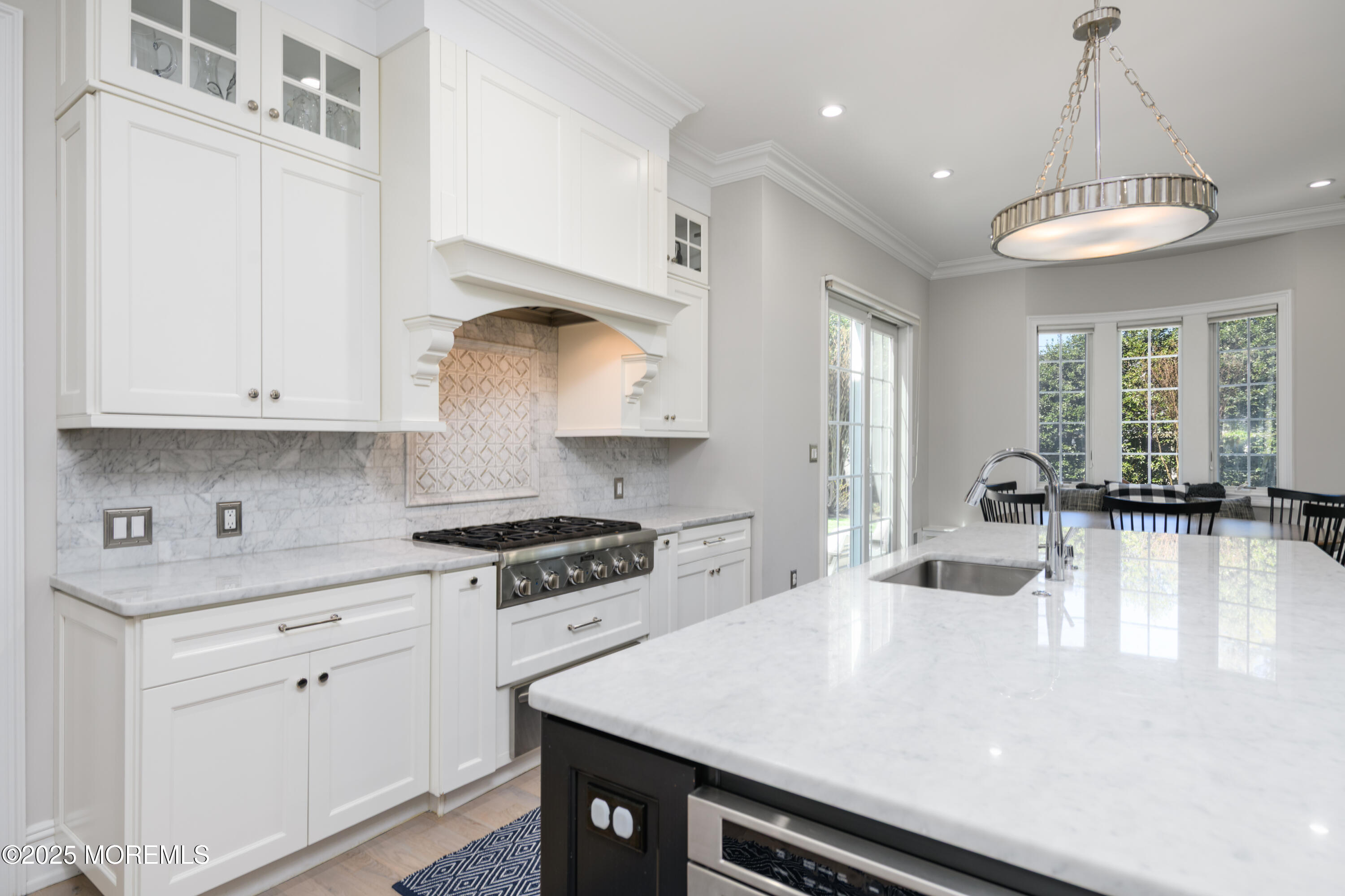 98 Harvard Road Fair Haven, NJ 07704 - Photo 5 of 51 a kitchen with a stove and a white cabinets