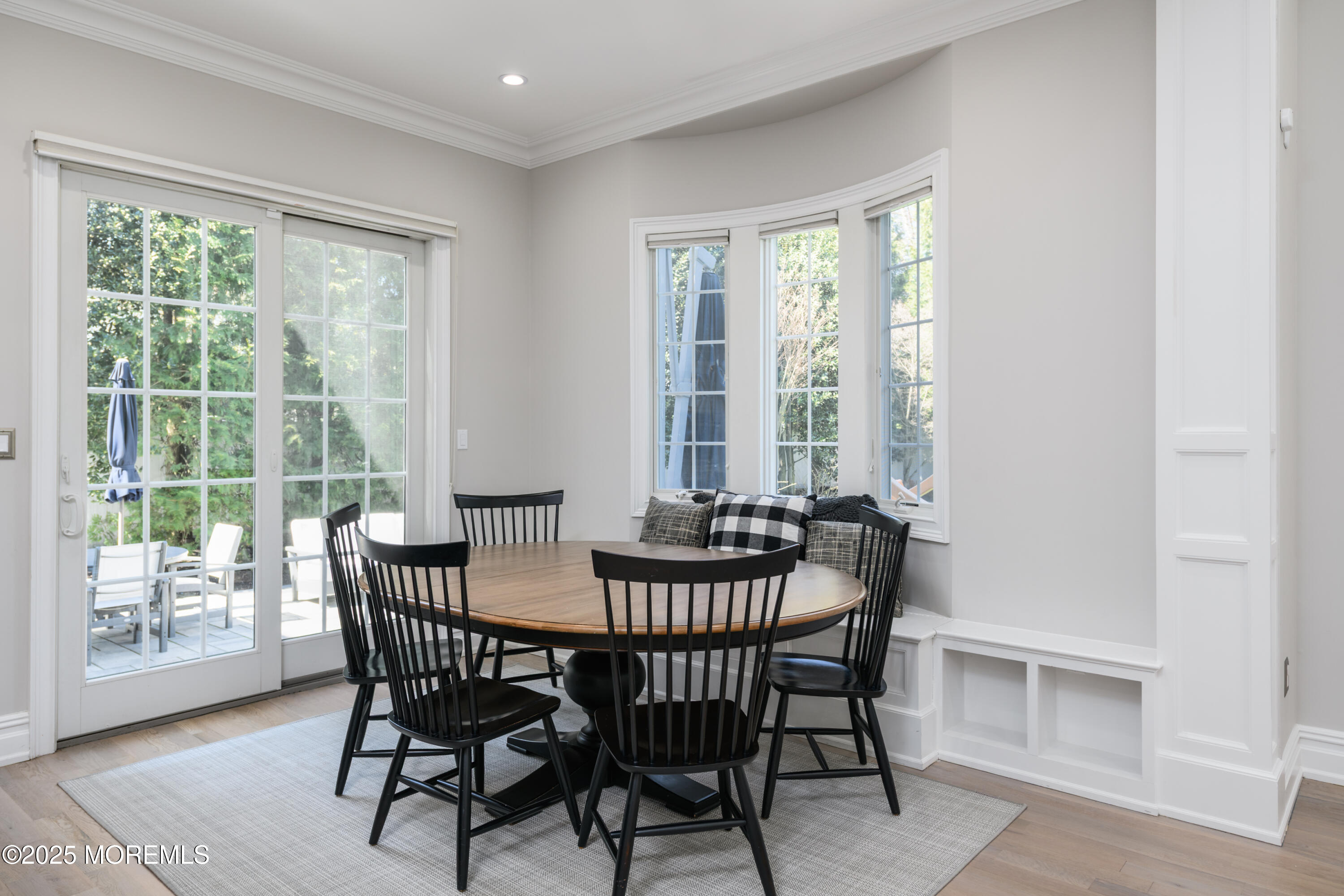 98 Harvard Road Fair Haven, NJ 07704 - Photo 10 of 51 a dining room with furniture window outside view and wooden floor