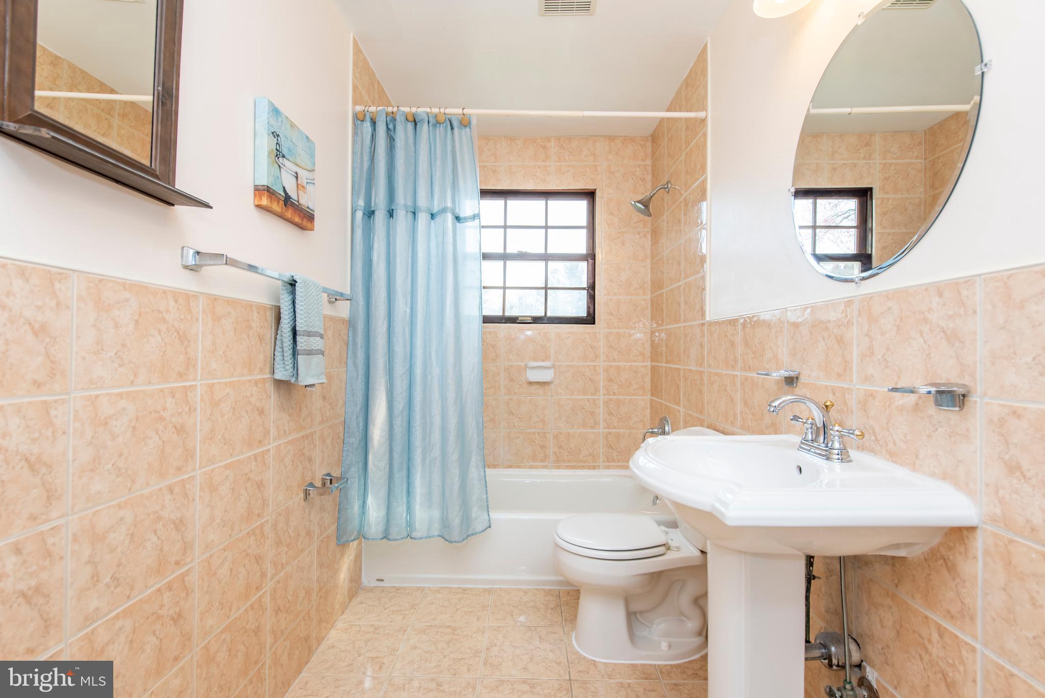 15336 Peach Orchard Road Silver Spring, MD 20905 - Photo 33 of 53 Upper Level Hall Bathroom