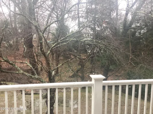a view of a wooden fence