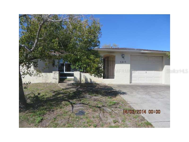 9215 Rainbow Lane Port Richey, FL 34668 - Photo 1 of 1 Exterior Front