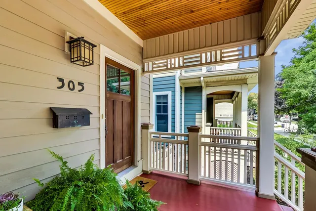 a front view of a house with a glass door