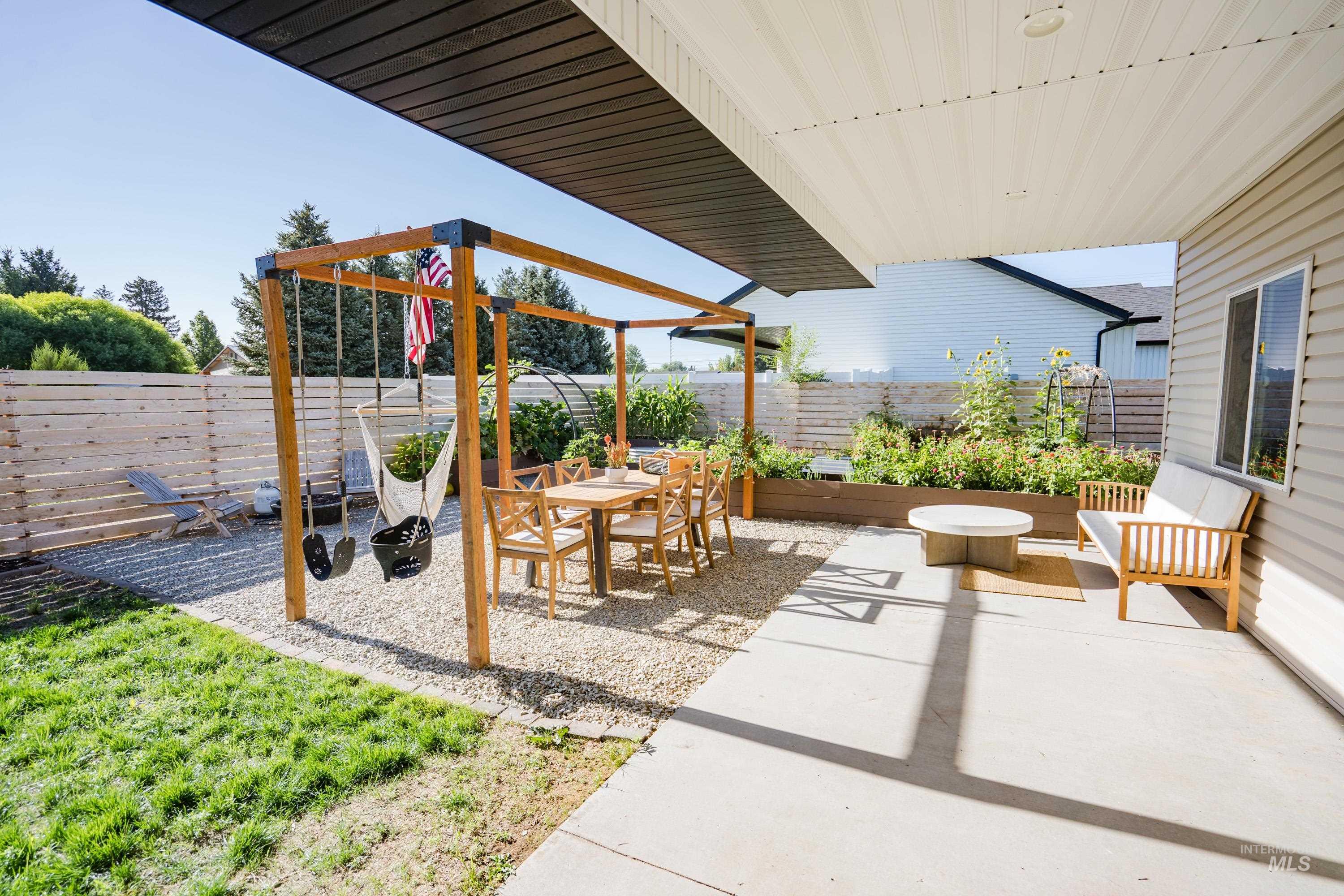 2110 Q Street Heyburn, ID 83336 - Photo 26 of 28 Fenced backyard featuring a patio