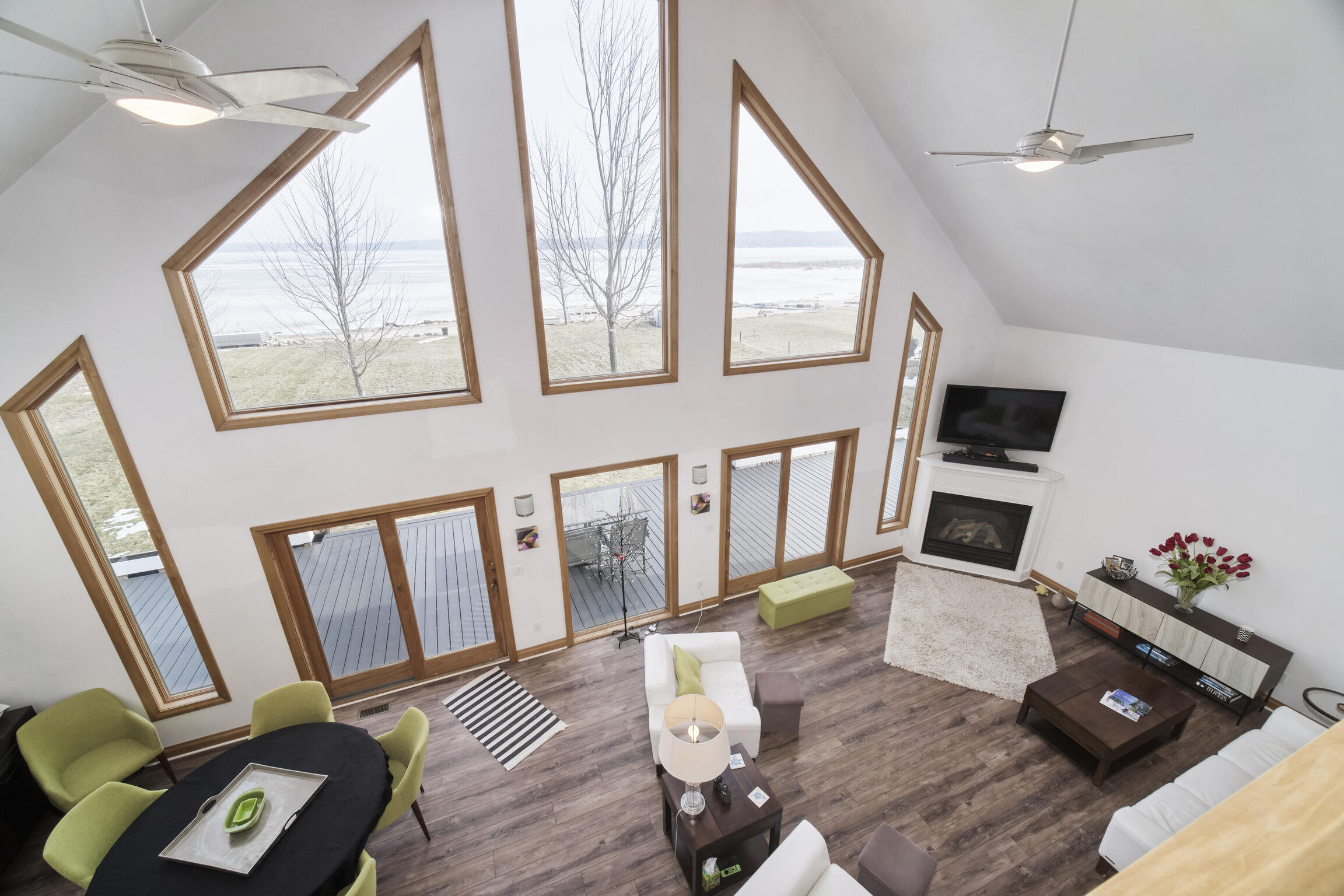 8579 Bayview Road Onekama, MI 49675 - Photo 17 of 72 Wall of Andersen windows