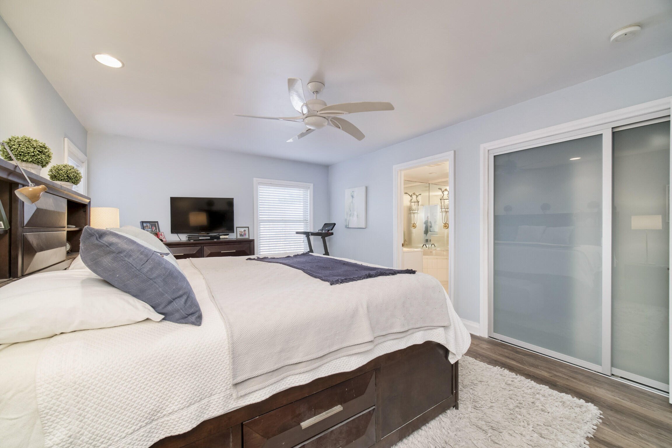 8579 Bayview Road Onekama, MI 49675 - Photo 31 of 72 Glass doors lead to walk-in closet