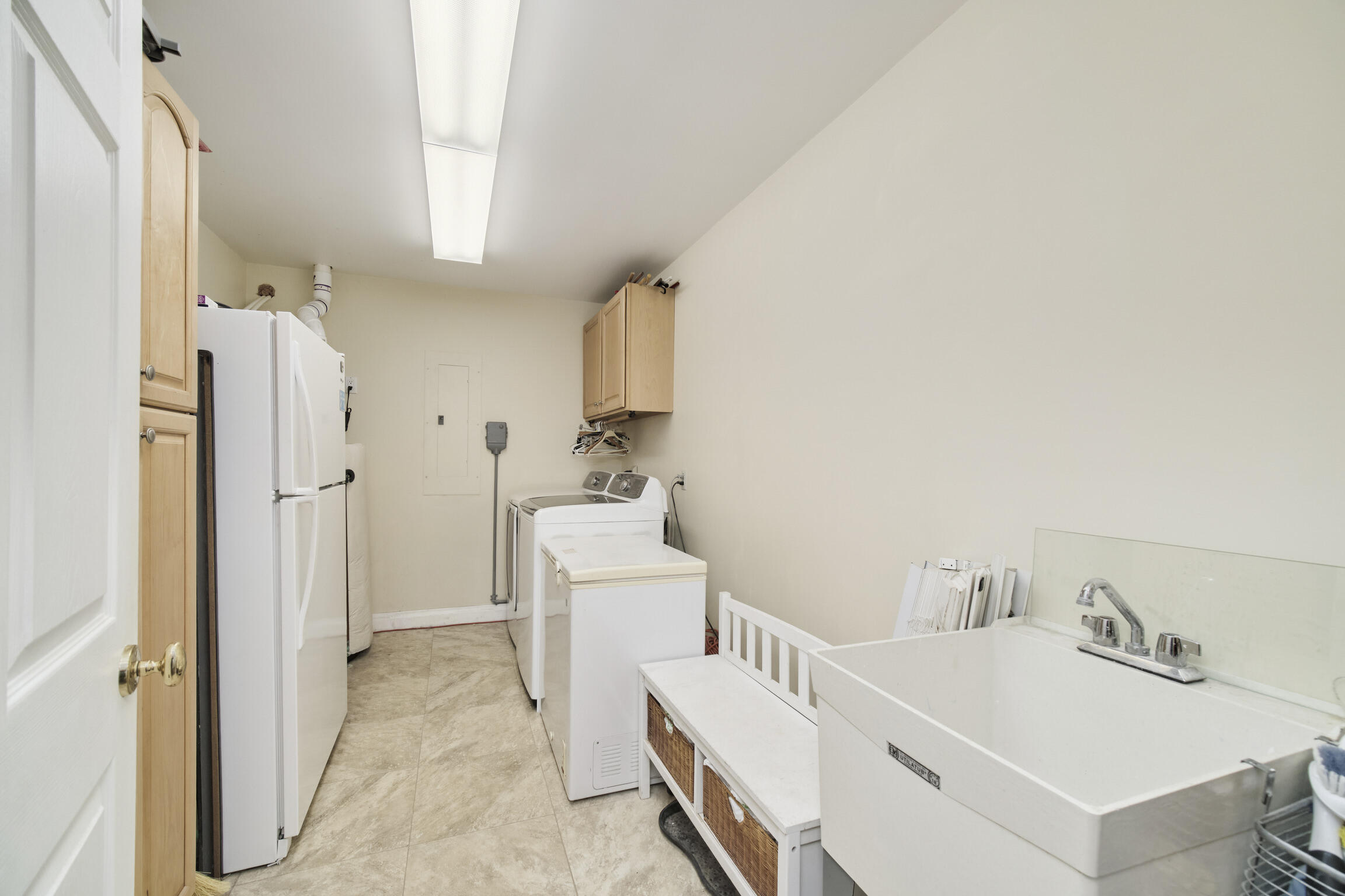 8579 Bayview Road Onekama, MI 49675 - Photo 40 of 72 Main floor laundry room