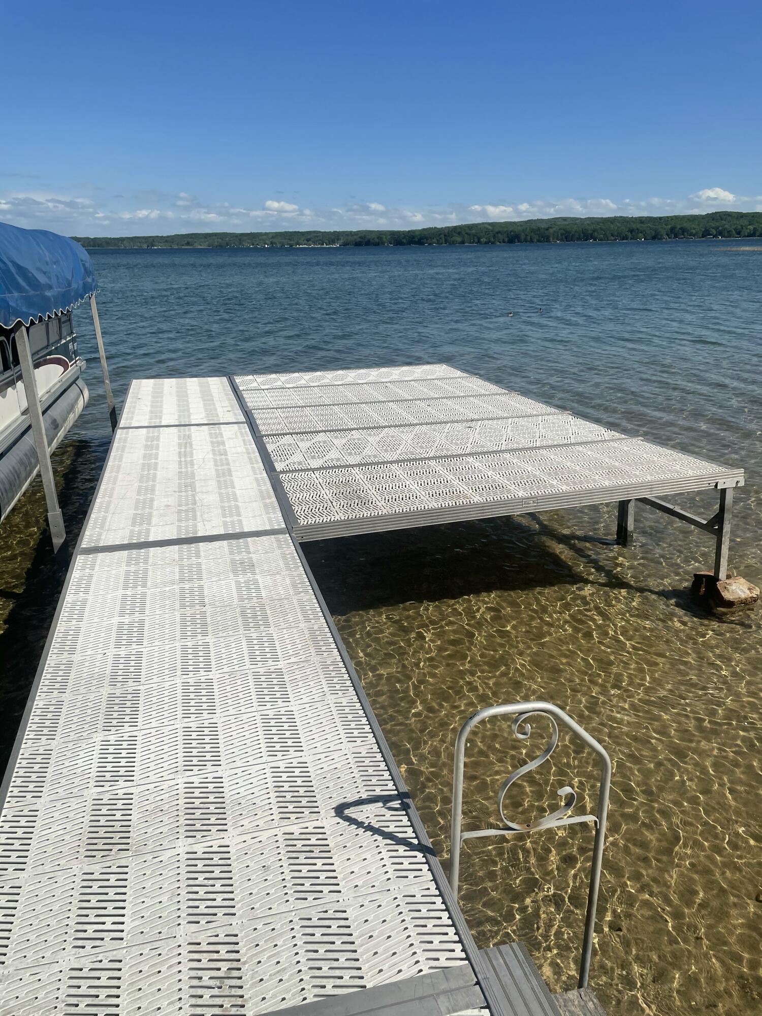 8579 Bayview Road Onekama, MI 49675 - Photo 8 of 72 Seating area on deck