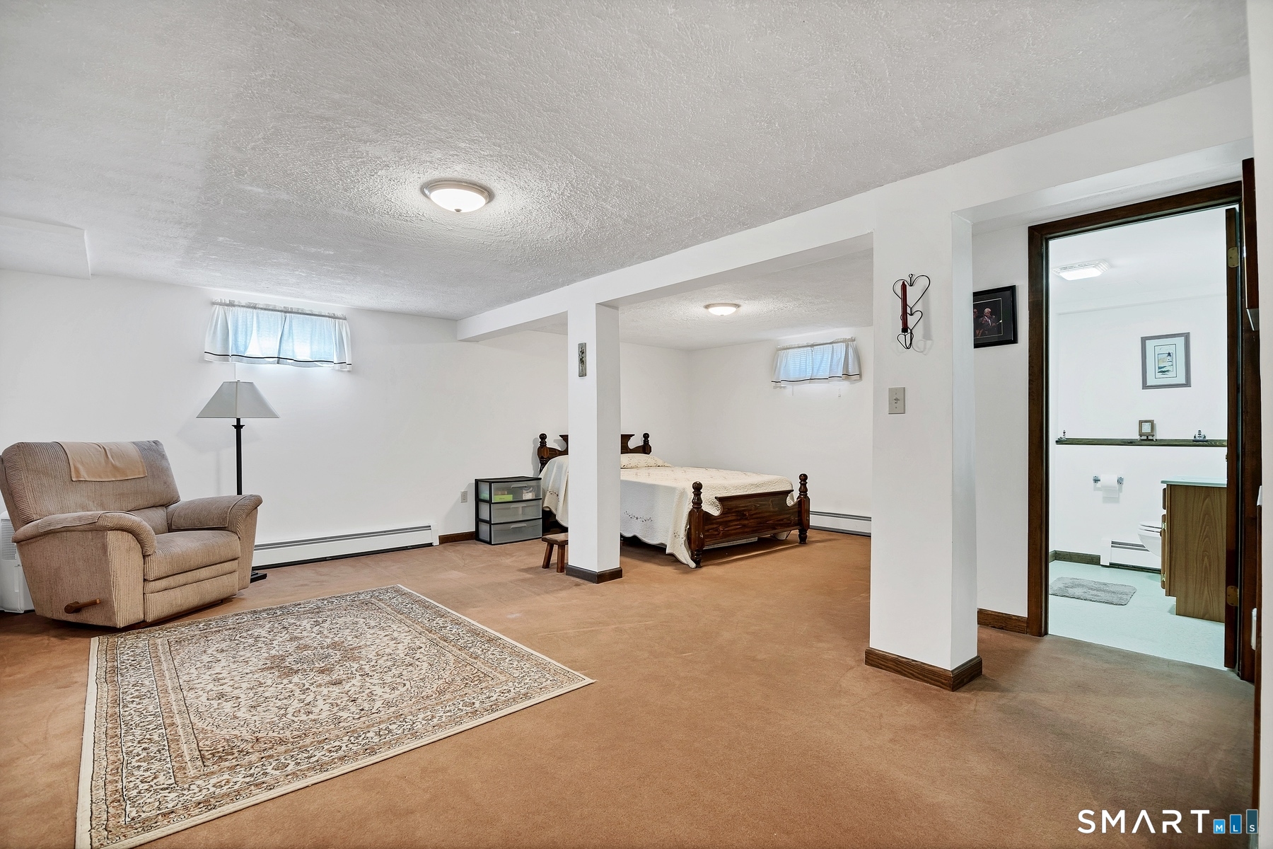 110 Meadow Lark Road Naugatuck, CT 06770 - Photo 18 of 40 a living room with furniture and a couch