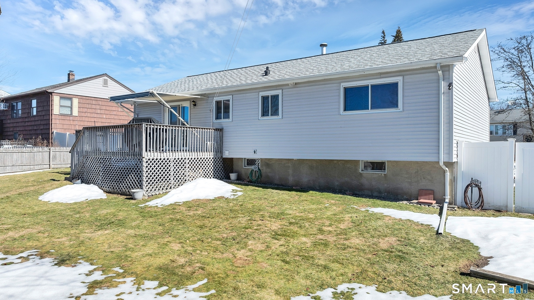 110 Meadow Lark Road Naugatuck, CT 06770 - Photo 27 of 40 a view of a house with snow on the side of the house