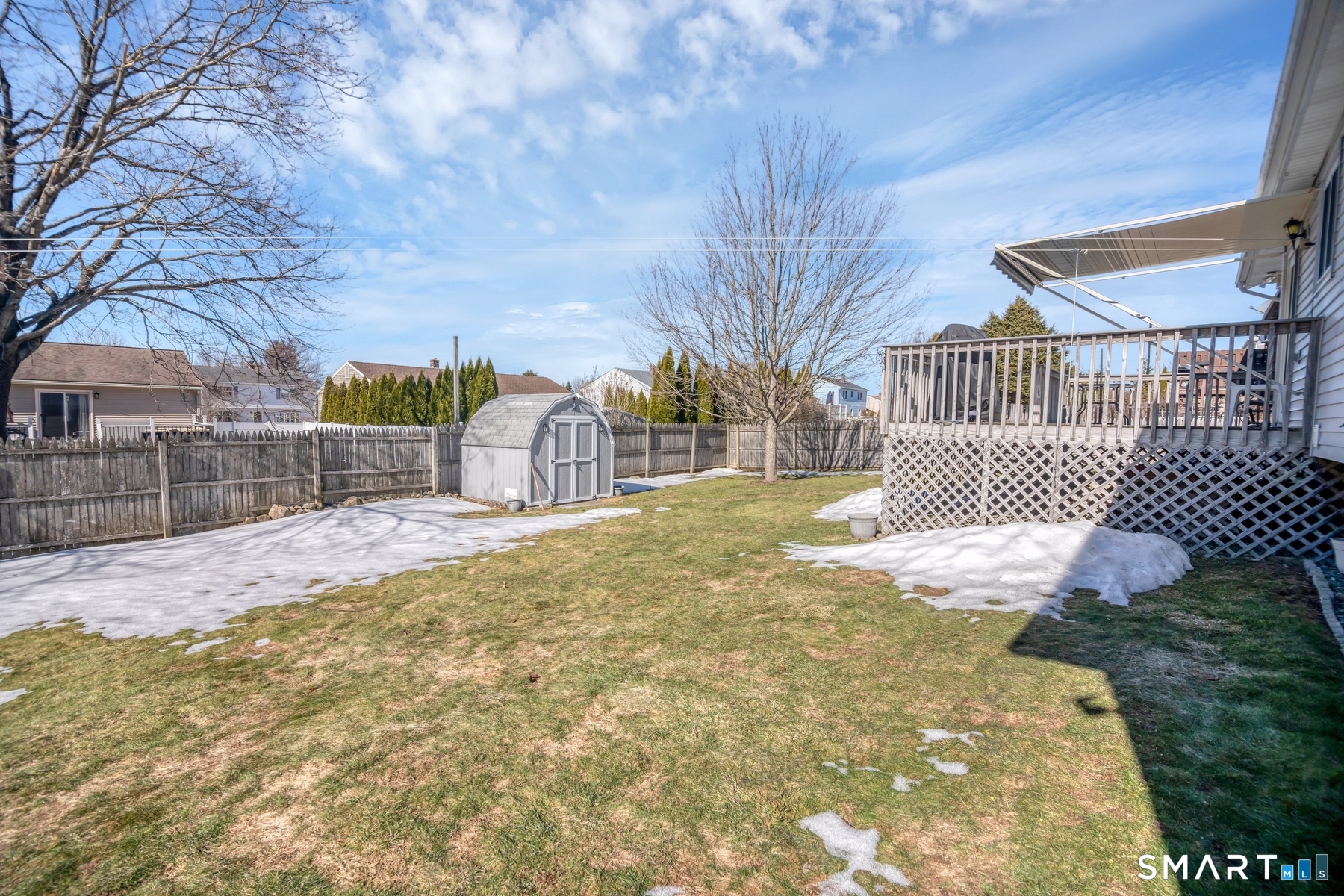110 Meadow Lark Road Naugatuck, CT 06770 - Photo 33 of 40 a view of backyard with wooden fence