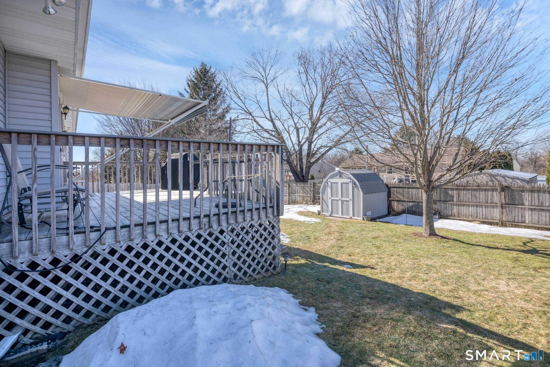 110 Meadow Lark Road Naugatuck, CT 06770 - Photo 38 of 40 a view of a yard with wooden fence