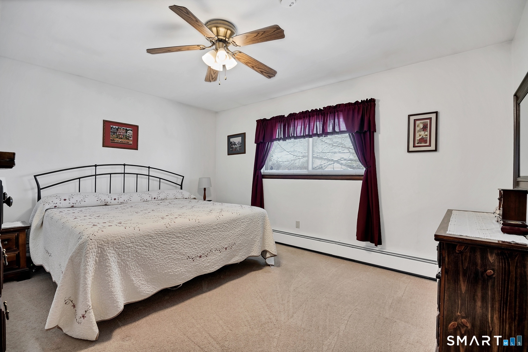 110 Meadow Lark Road Naugatuck, CT 06770 - Photo 10 of 40 a bedroom with a bed and a view of kitchen