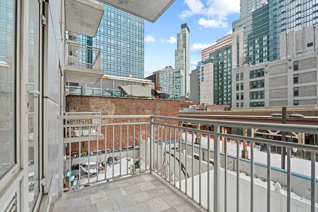 a view of kitchen with wooden floor