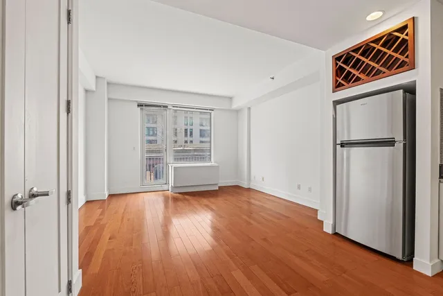 a kitchen with a table and chairs in it
