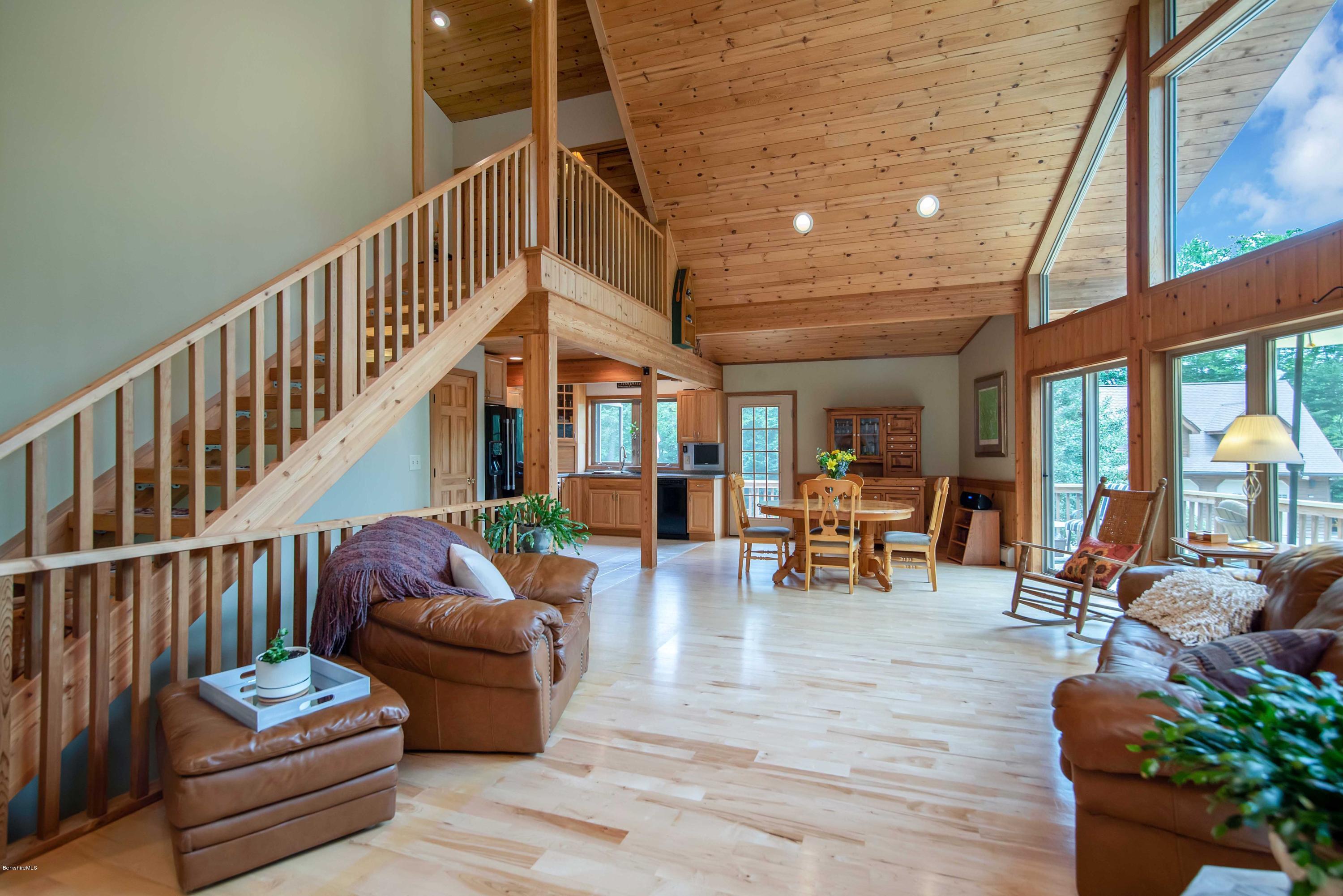 106 Dimmock Road Otis, MA 01253 - Photo 17 of 42 a living room with furniture and wooden floor