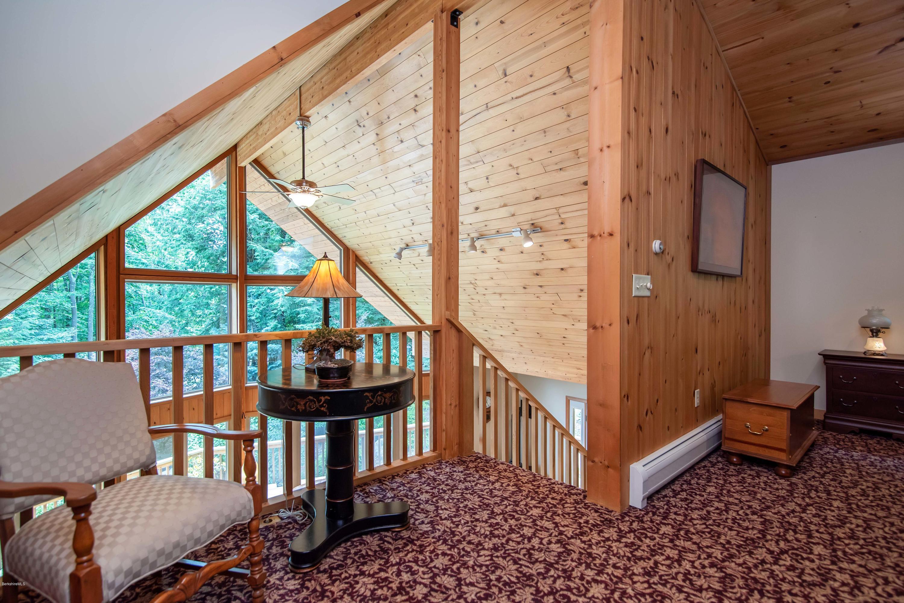 106 Dimmock Road Otis, MA 01253 - Photo 20 of 42 a view of a porch with furniture