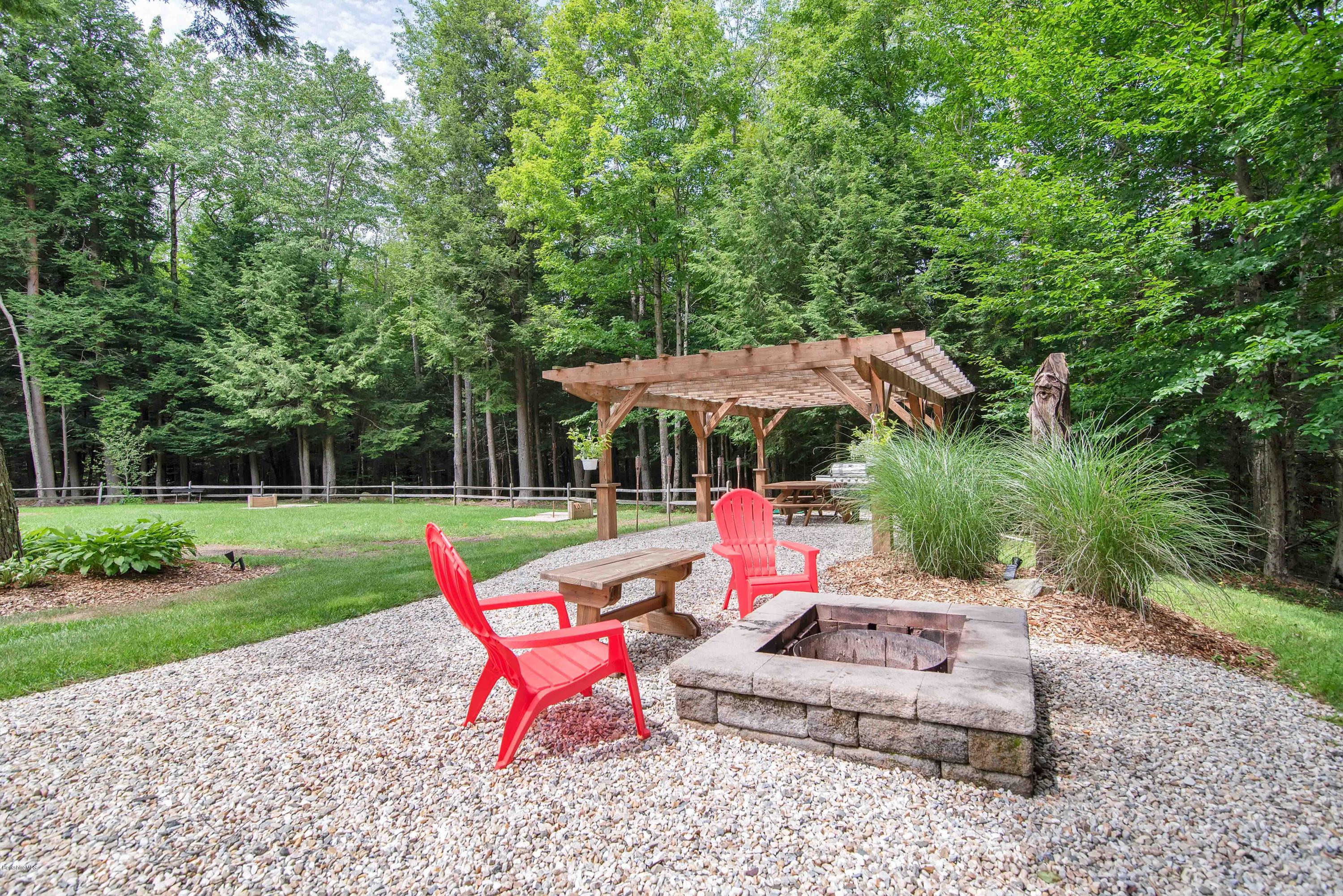 106 Dimmock Road Otis, MA 01253 - Photo 33 of 42 a view of backyard with swimming pool and green space