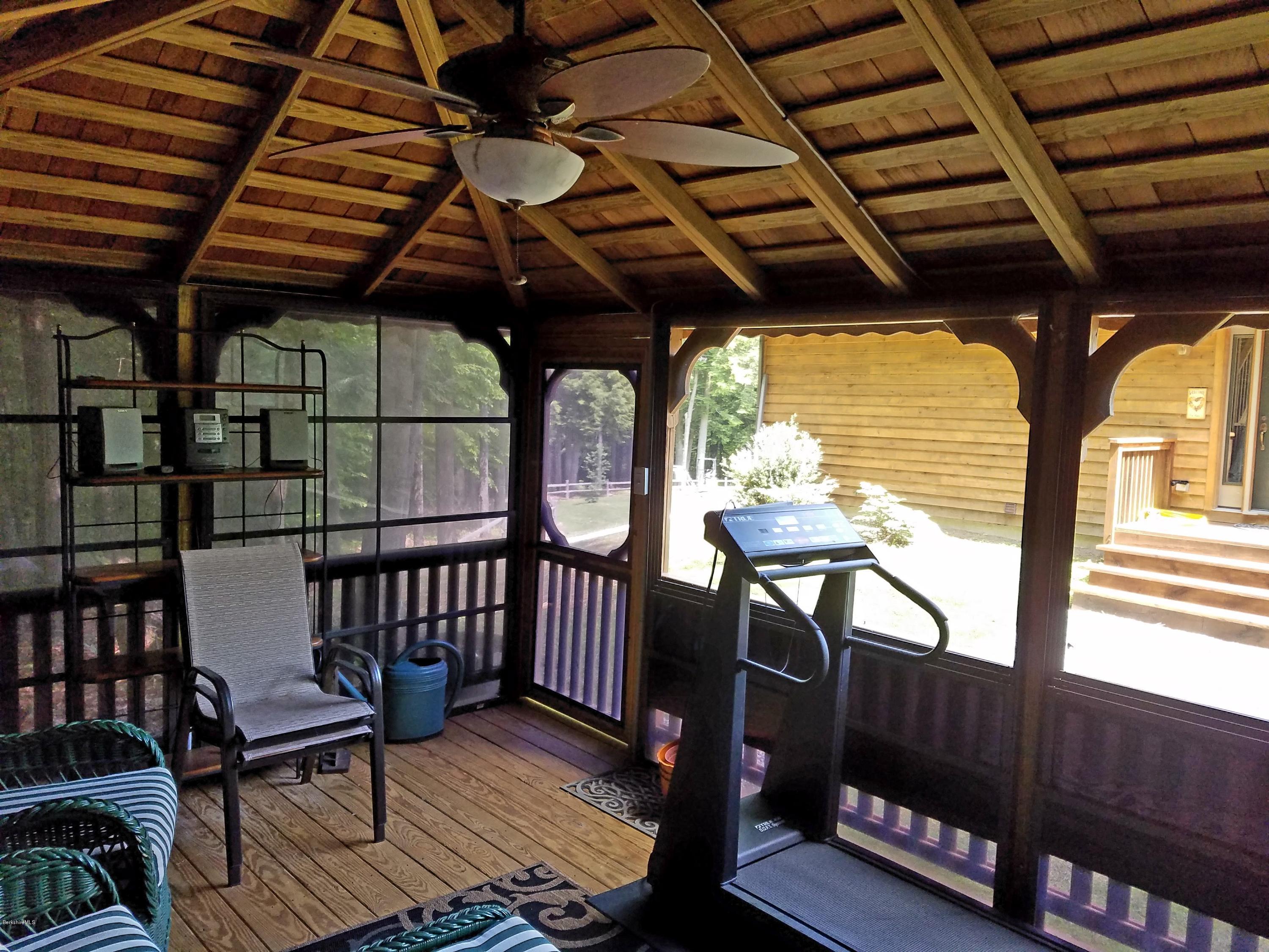 106 Dimmock Road Otis, MA 01253 - Photo 34 of 42 a view of porch with wooden furniture