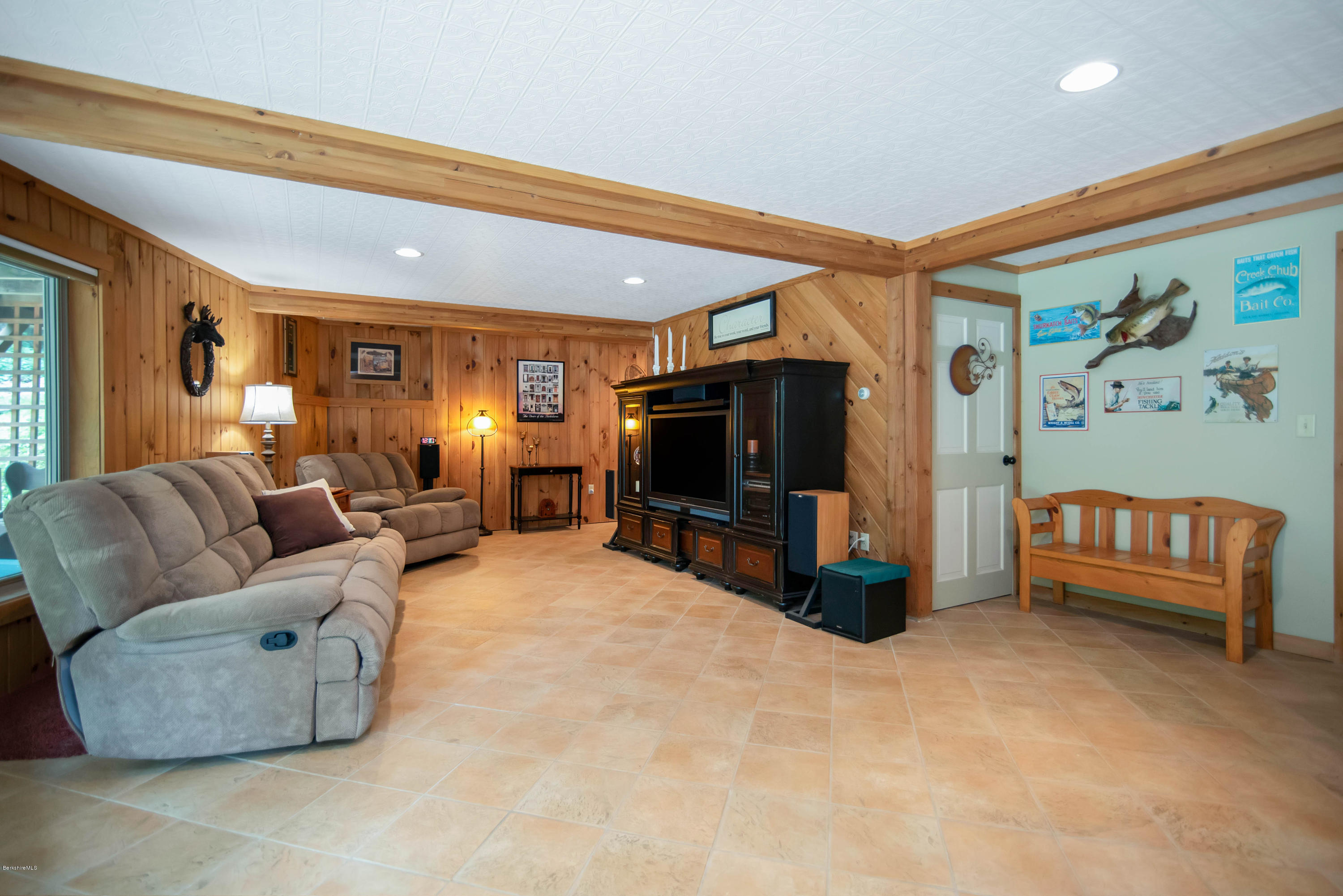 106 Dimmock Road Otis, MA 01253 - Photo 6 of 42 a living room with furniture and a flat screen tv