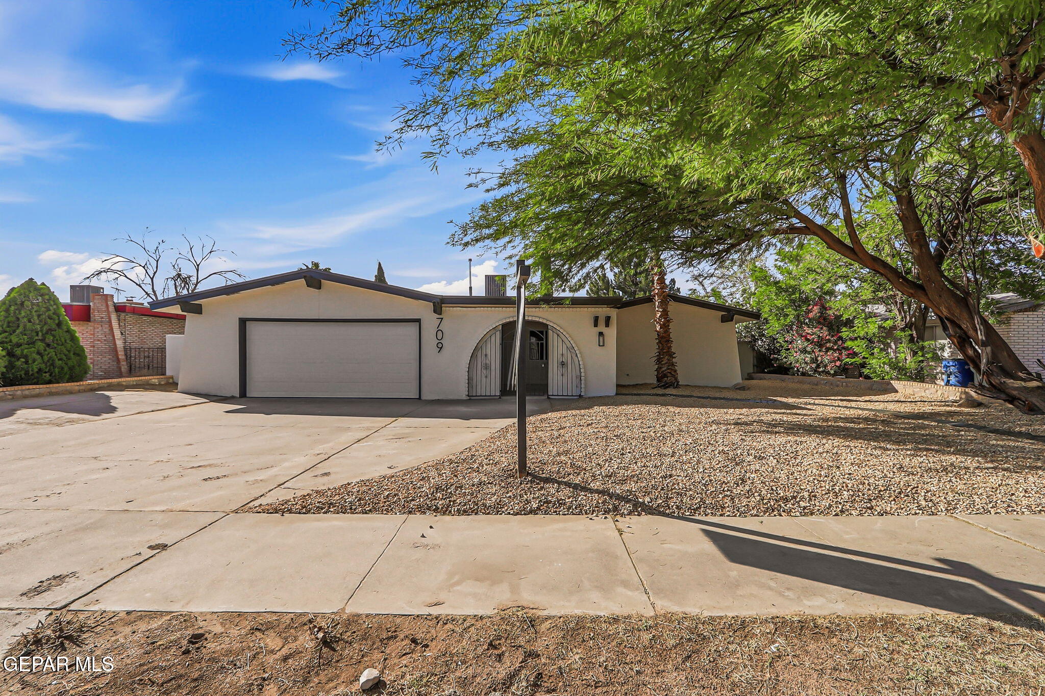 709 Frontera Road El Paso, TX 79922 - Photo 3 of 41 a house view with a backyard space
