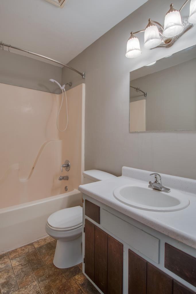 2217 South Ranch Road Murfreesboro, TN 37129 - Photo 6 of 10 The bathroom has plenty of vanity storage and a lovely light fixture.