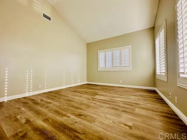 a view of an empty room and window