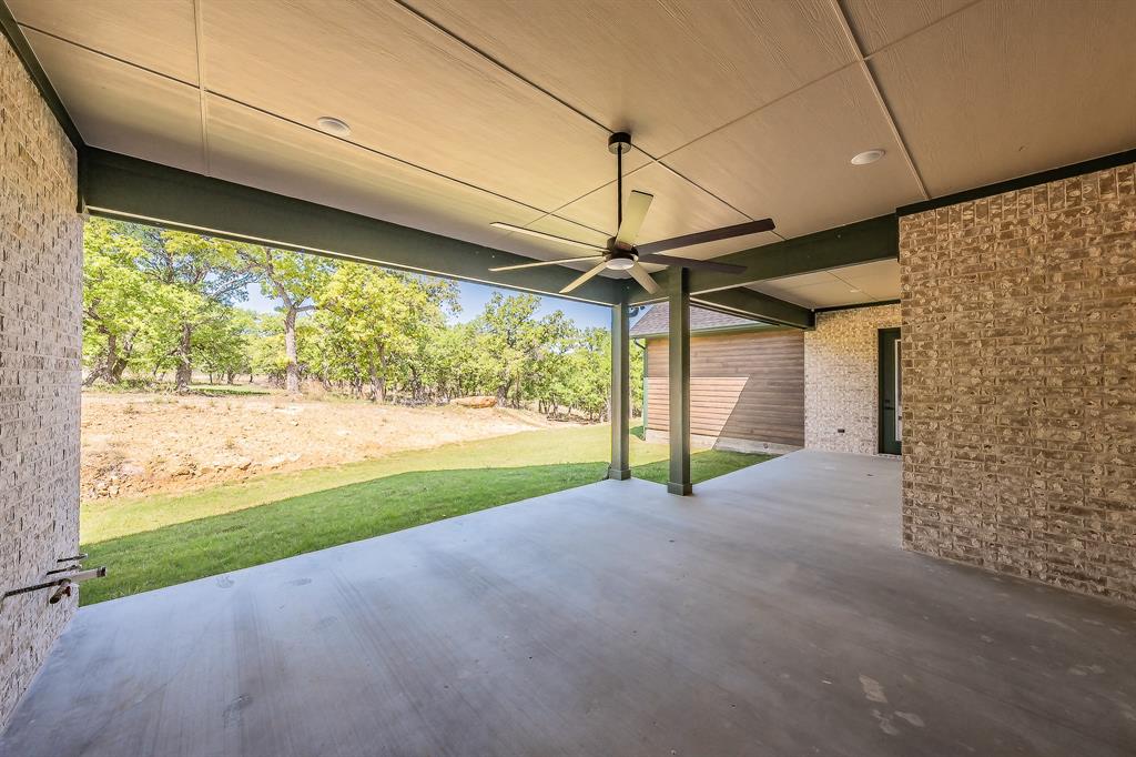 114 Ridgeline Drive Chico, TX 76431 - Photo 30 of 38 Expansive Patio for outdoor entertaining.