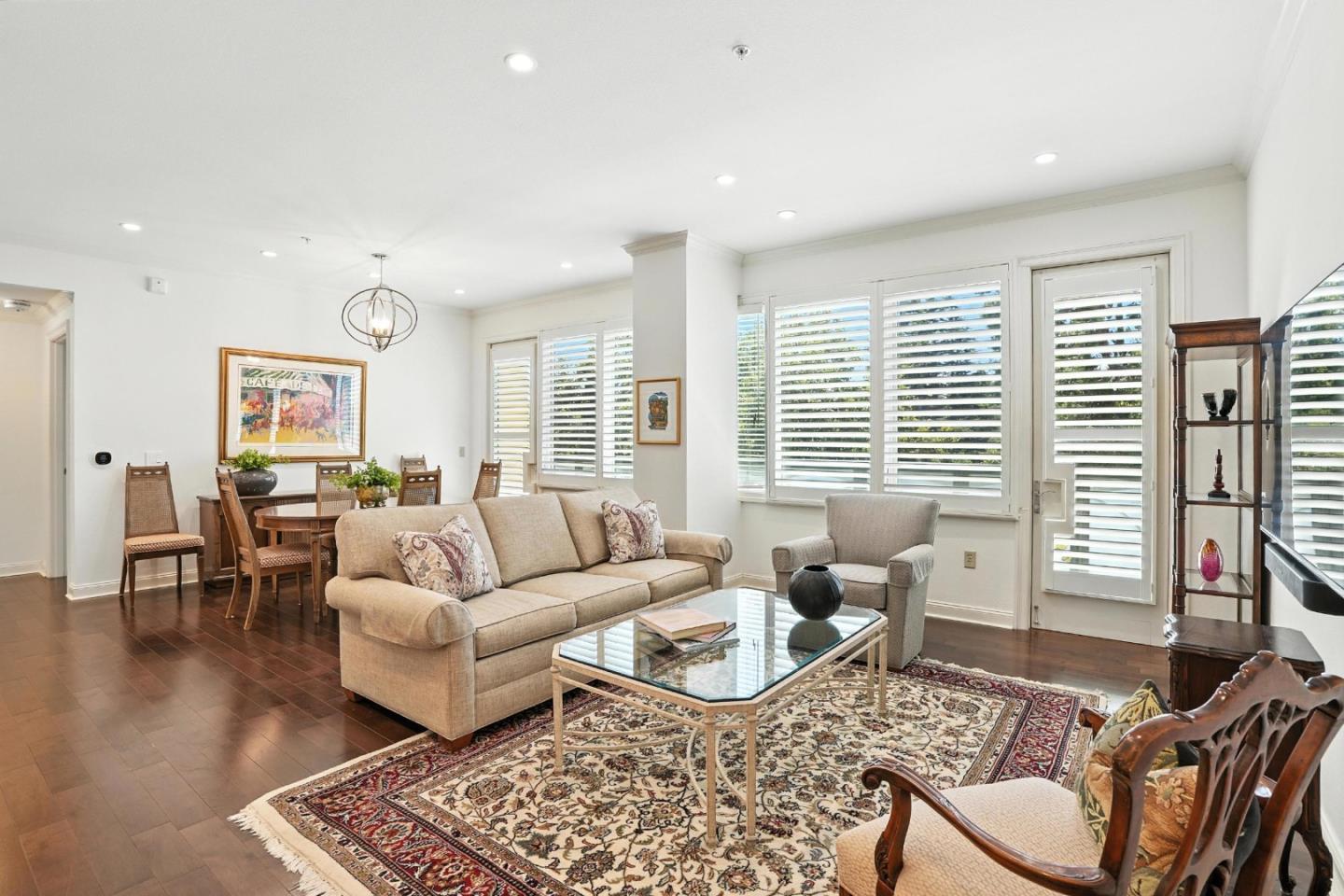 10 Crystal Springs Road, Unit 1507 San Mateo, CA 94402 - Photo 7 of 33 a living room with furniture and floor to ceiling windows