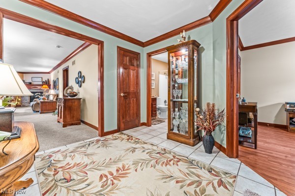 197 Mathews Road, Unit A Youngstown, OH 44512 - Photo 9 of 32 Entryway featuring ornamental molding and light hardwood / wood-style floors