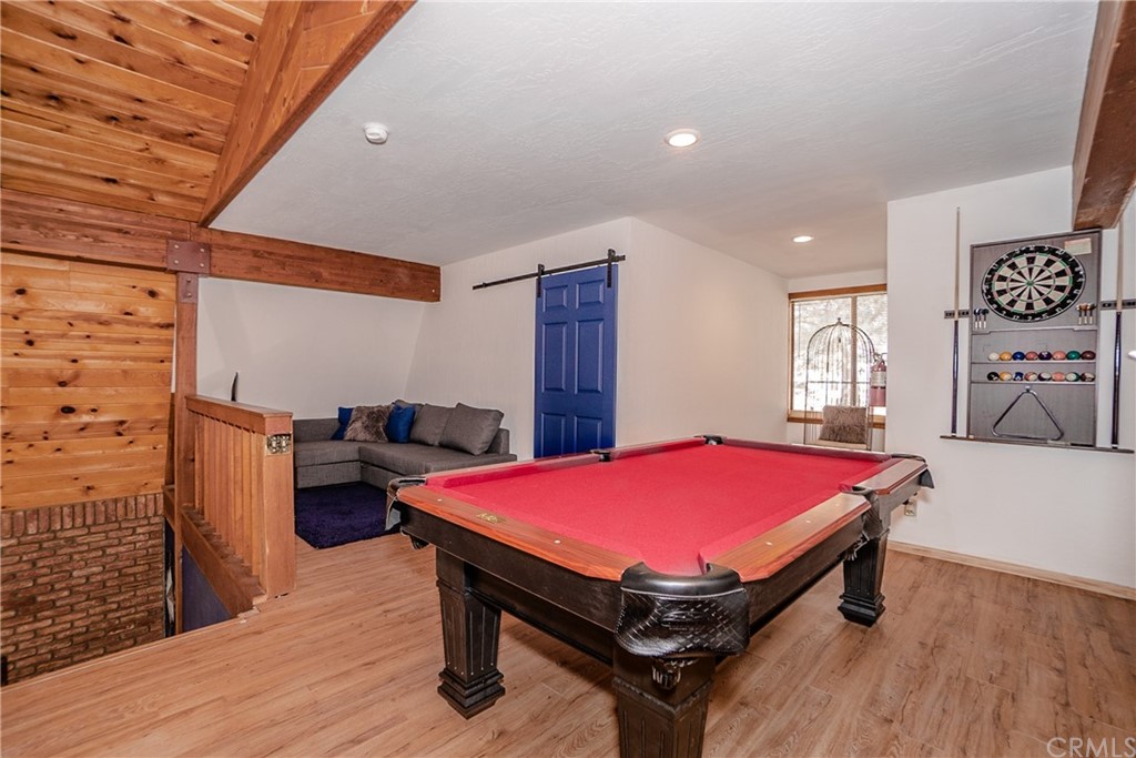 725 Temple Lane Big Bear Lake, CA 92315 - Photo 17 of 65 a room with pool table and windows