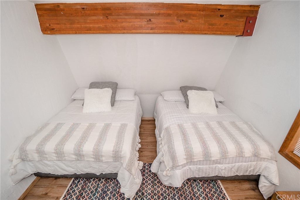 725 Temple Lane Big Bear Lake, CA 92315 - Photo 45 of 65 a bathroom with a sink and a mirror