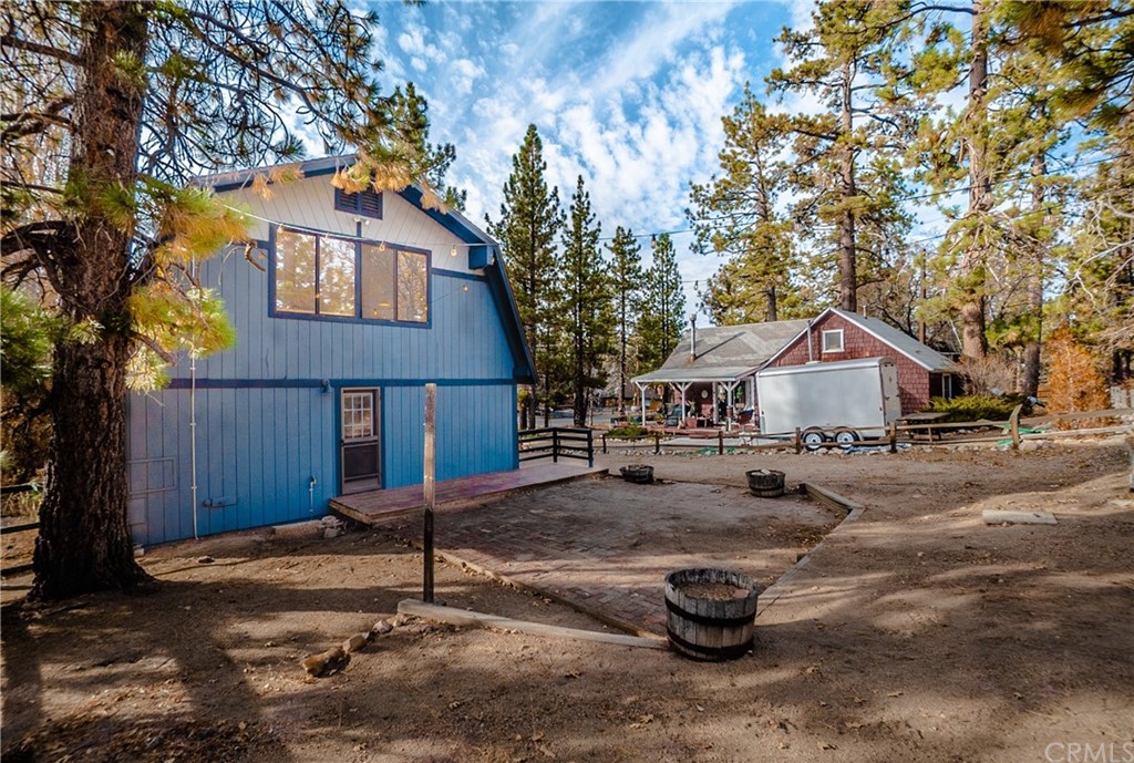 725 Temple Lane Big Bear Lake, CA 92315 - Photo 62 of 65 a front view of a house with a yard