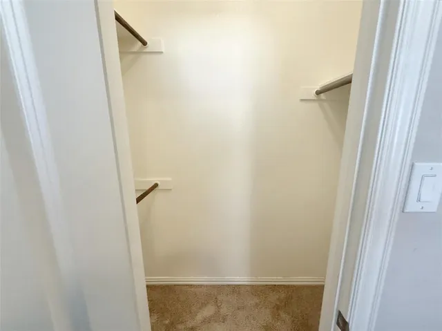 a view of a building with sitting area