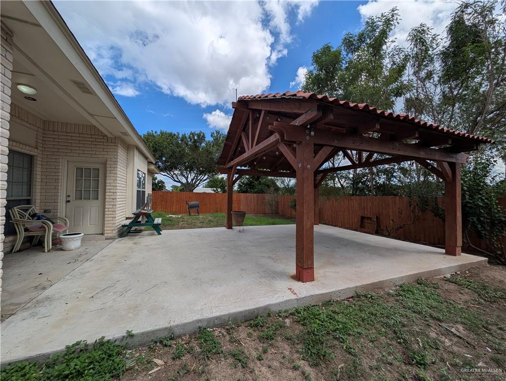 2000 East 25th Street Mission, TX 78574 - Photo 17 of 27 Fenced backyard featuring a patio and a gazebo