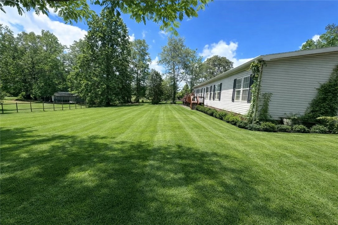 1400 Massey Road Pendleton, SC 29670 - Photo 1 of 25 Expansive lawn and inviting exterior create a serene outdoor living space.