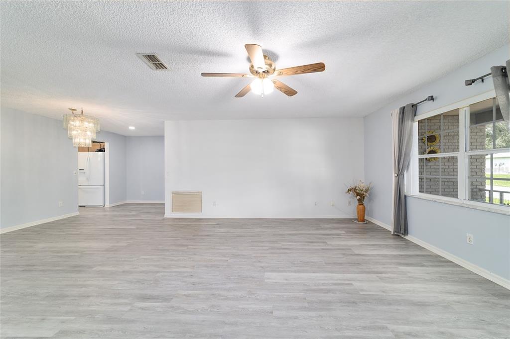 9662 Southwest 97th Lane Ocala, FL 34481 - Photo 16 of 52 a view of an empty room with a window