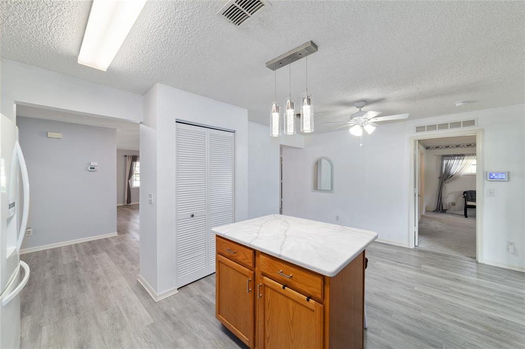 9662 Southwest 97th Lane Ocala, FL 34481 - Photo 27 of 52 a view of a kitchen cabinets and wooden floor