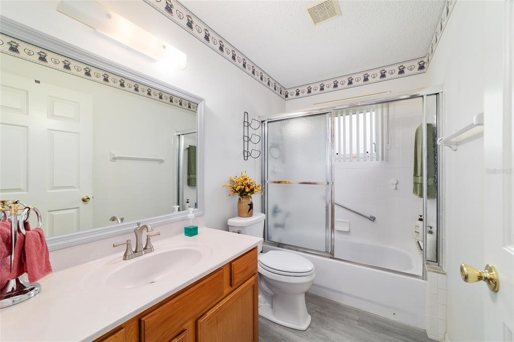 9662 Southwest 97th Lane Ocala, FL 34481 - Photo 41 of 52 a bathroom with a sink toilet and shower