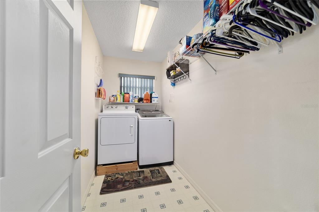 9662 Southwest 97th Lane Ocala, FL 34481 - Photo 44 of 52 a utility room with dryer and washer