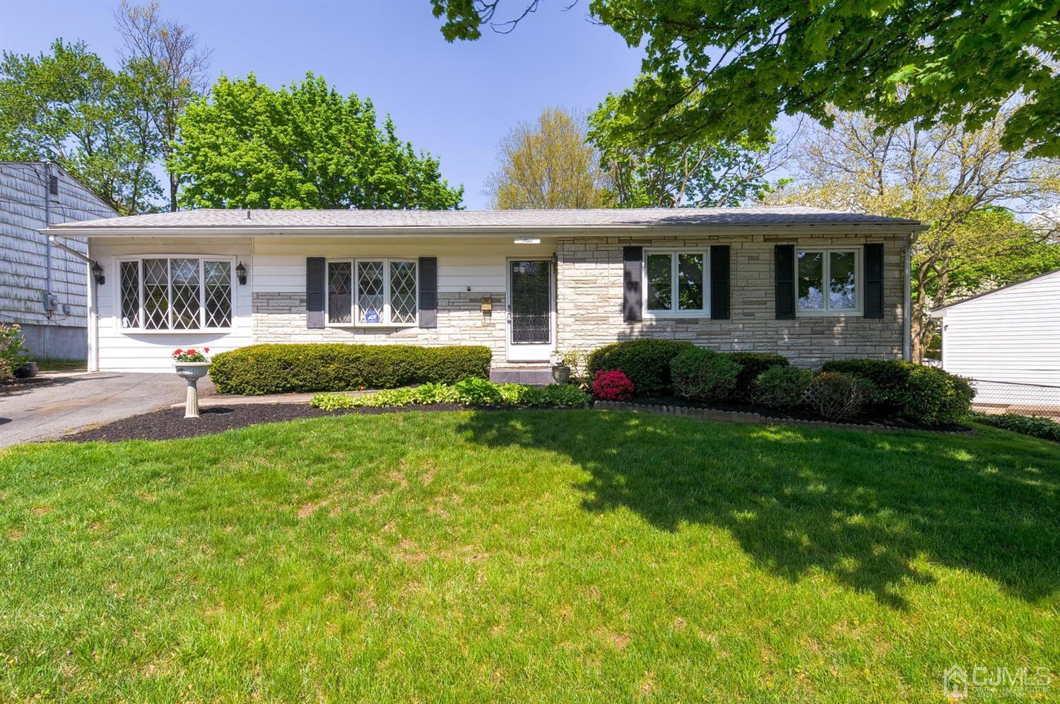 9 Villanova Road Old Bridge, NJ 08859 - Photo 1 of 29 a front view of a house with garden