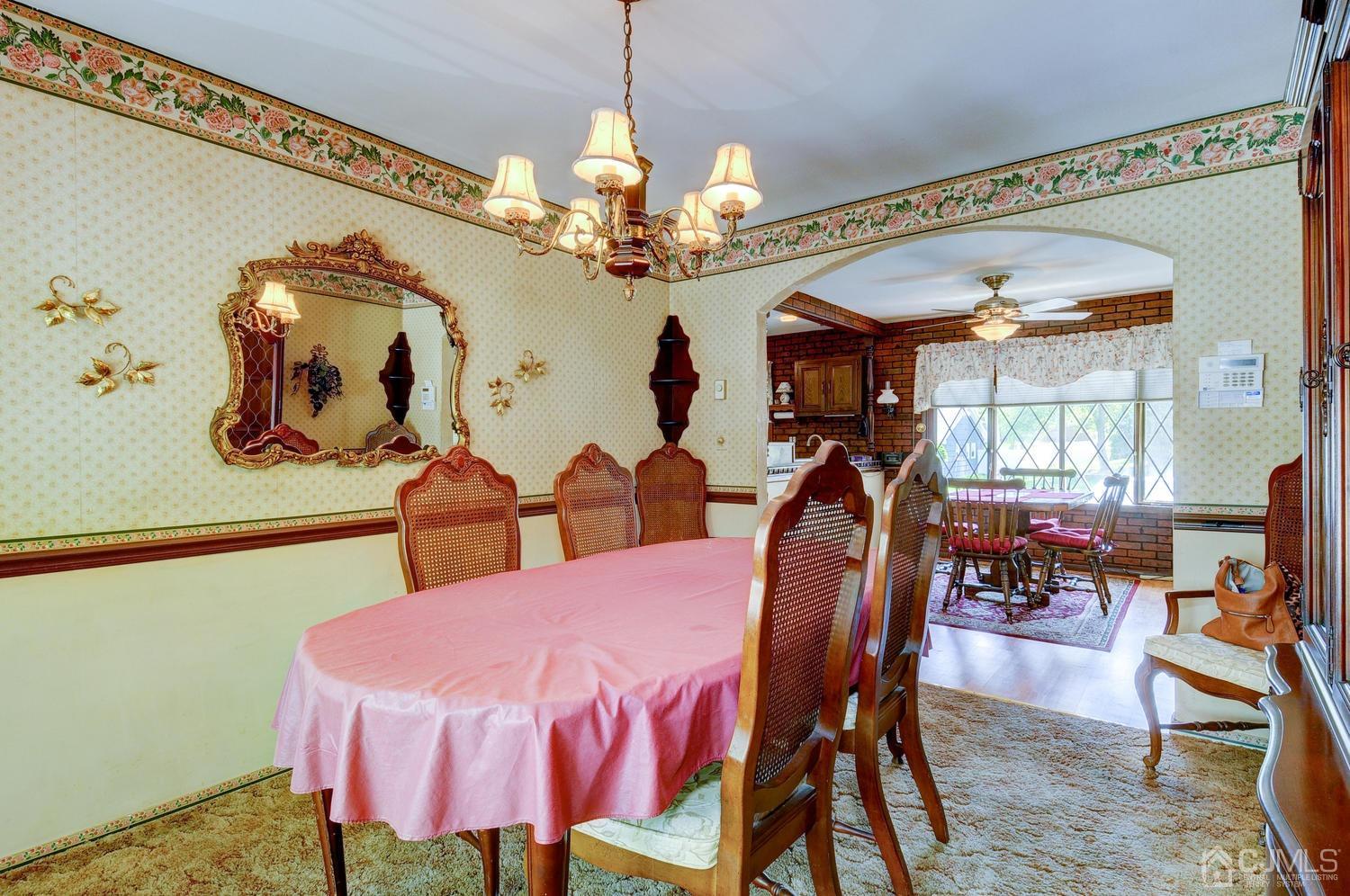 9 Villanova Road Old Bridge, NJ 08859 - Photo 16 of 29 a view of a dining room with furniture and chandelier