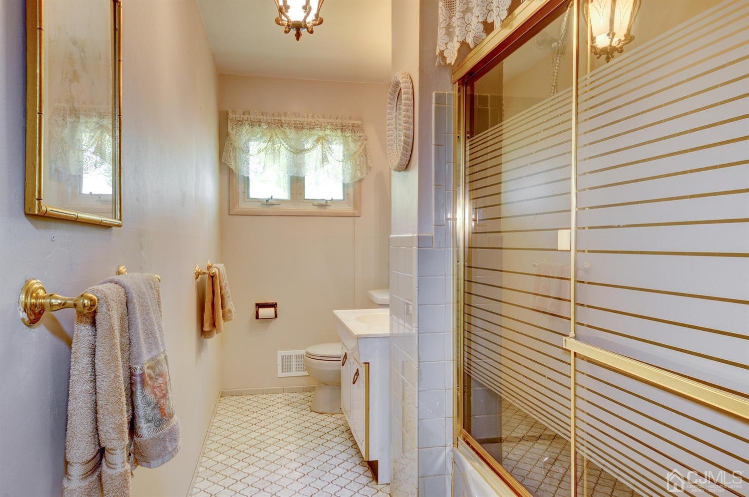 9 Villanova Road Old Bridge, NJ 08859 - Photo 18 of 29 a bathroom with a toilet and a shower
