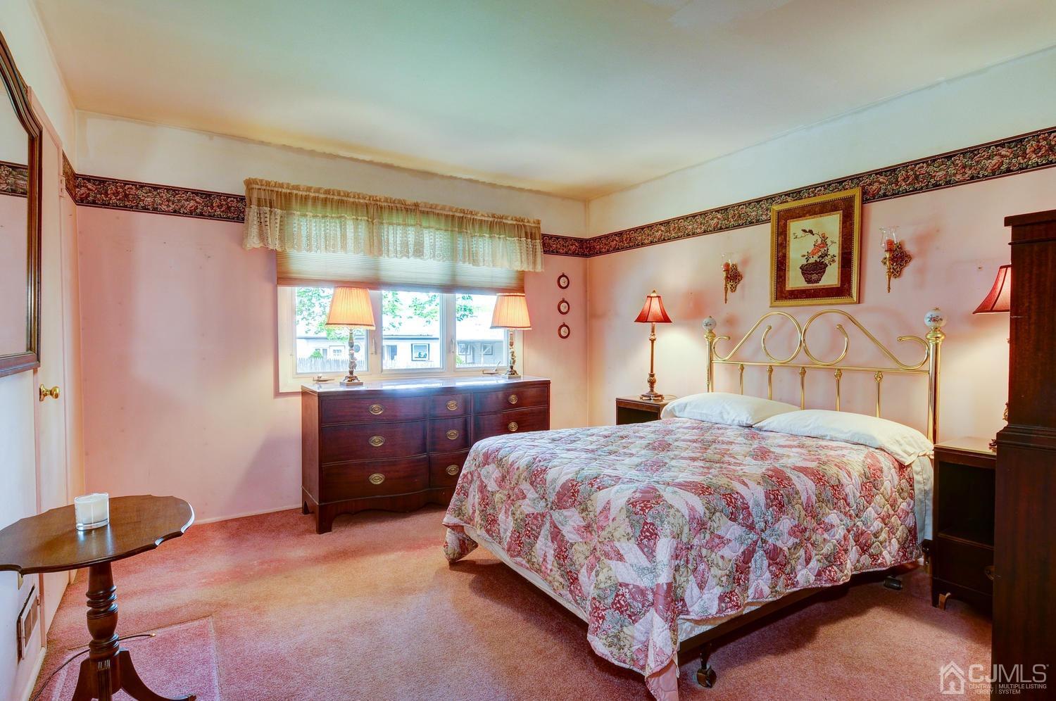 9 Villanova Road Old Bridge, NJ 08859 - Photo 19 of 29 a bedroom with a bed and a window